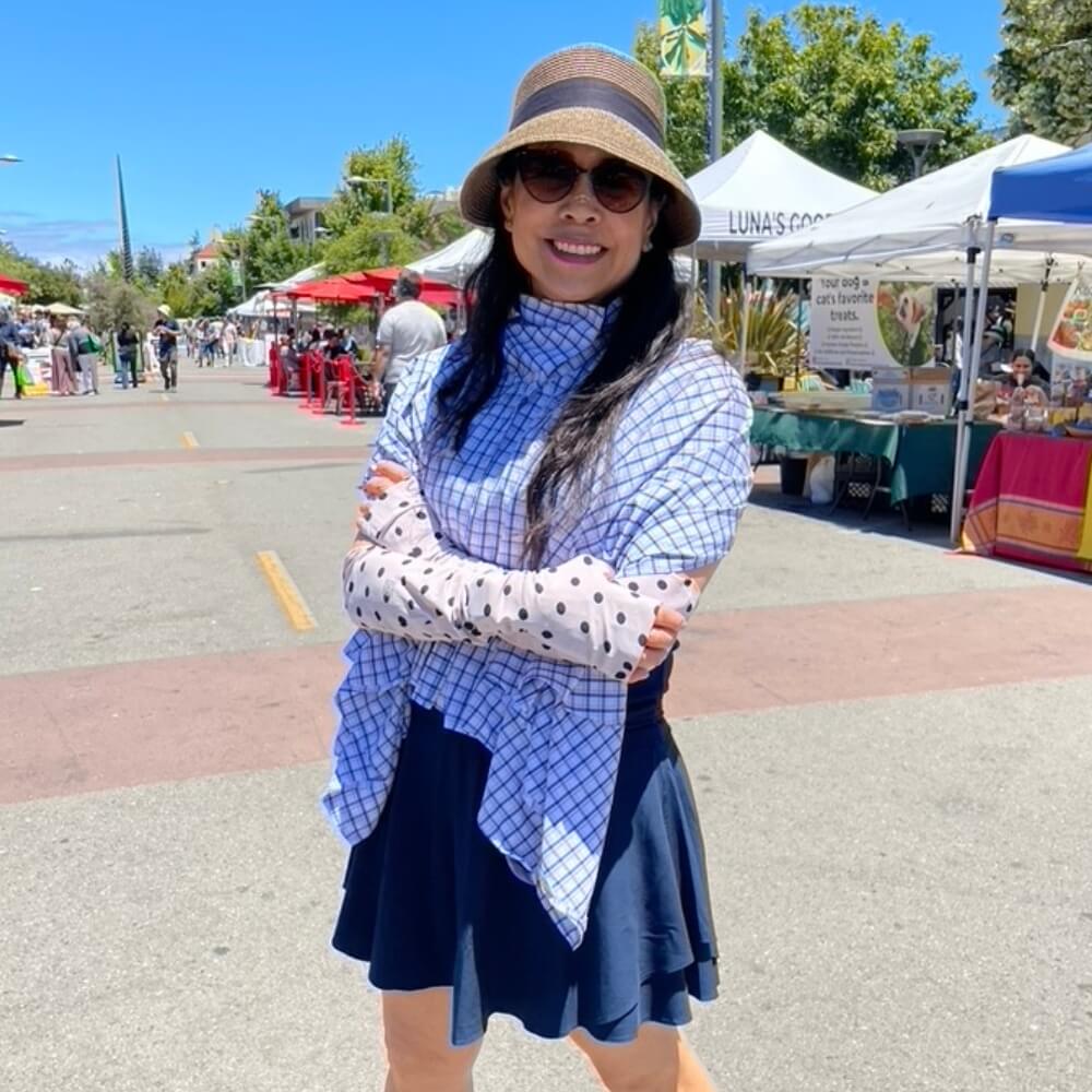 Heliades fashionable UPF 50+ Sol Escape sun protective shawl and Sun Gauntlets for hand and arm protection.