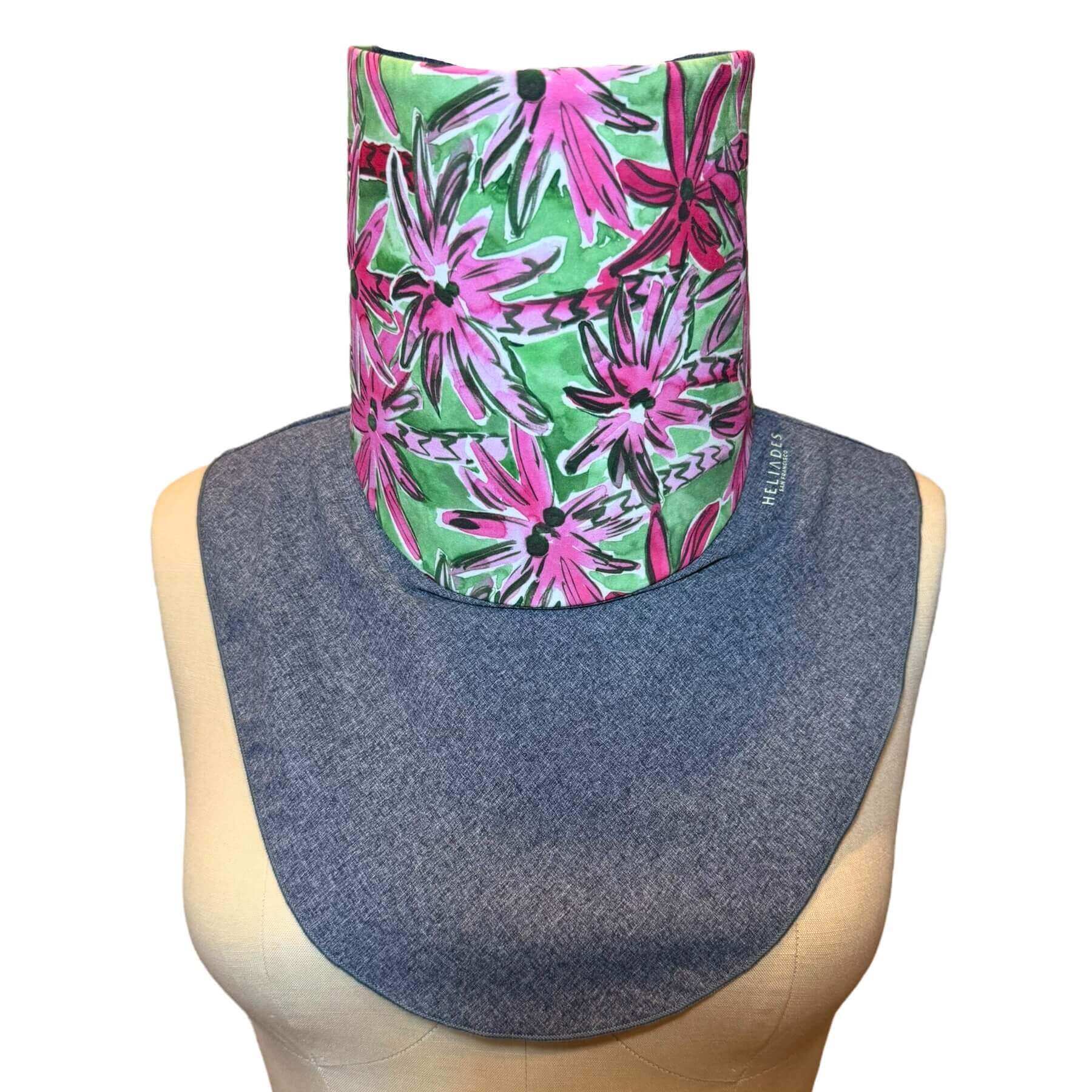 Stay stylish sun protection neck wrap in blue melange with fashion print: pink palm trees on green