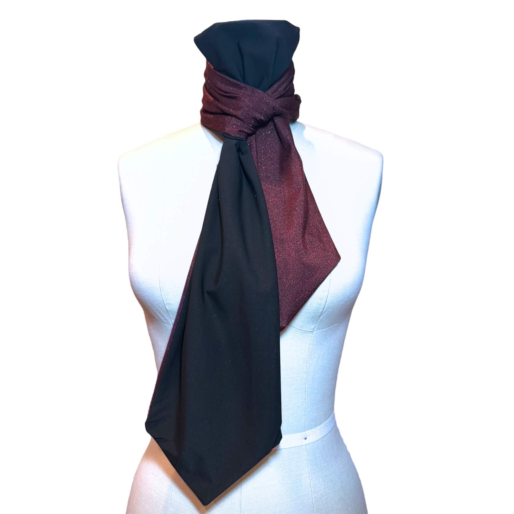 Fashion sun scarf shown on mannequin in merlot gold sparkle with black on reverse