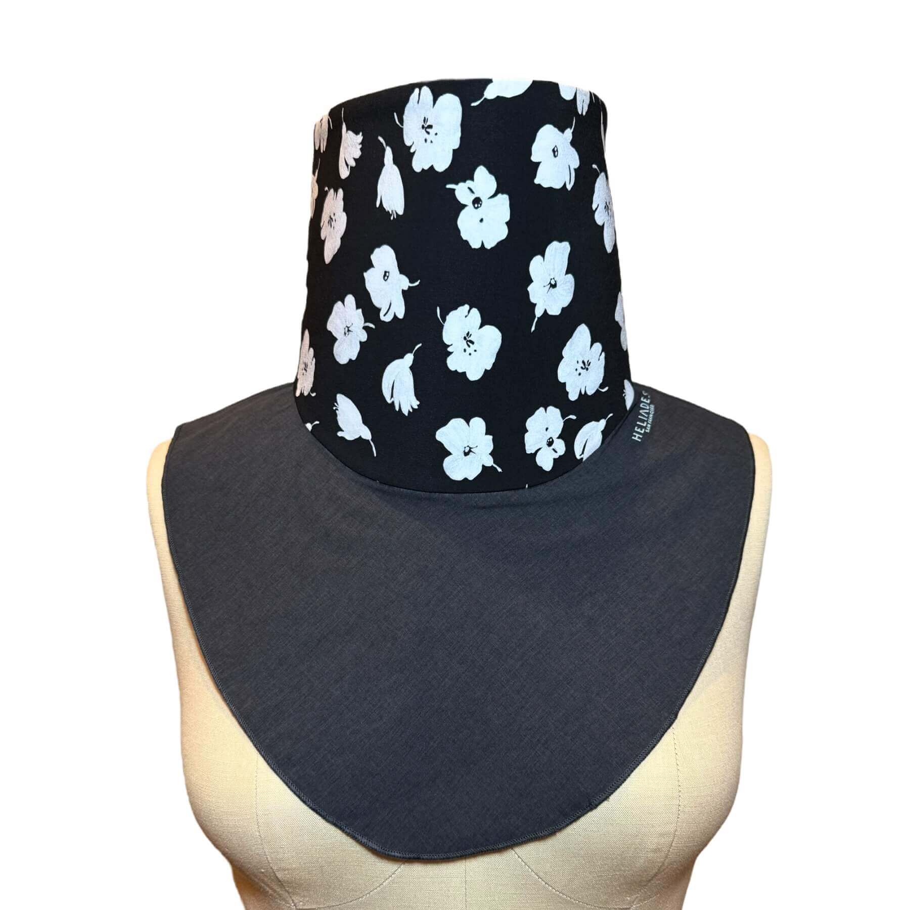 UV protection scarves - sun-smart UPF 50+ fashion Sun Dickey shown on mannequin in charcoal gray melange with white painted flowers on black.