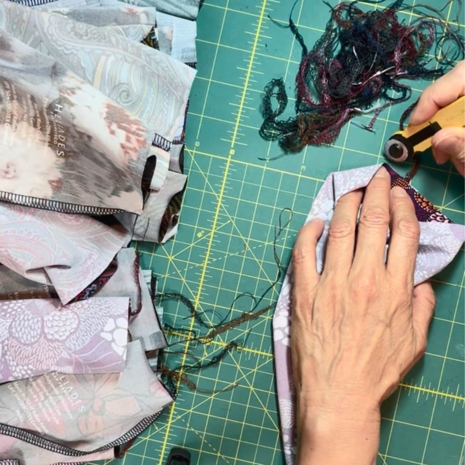 Finishing construction of UPF 50+ Sun Gauntlets for hand and arm protection.