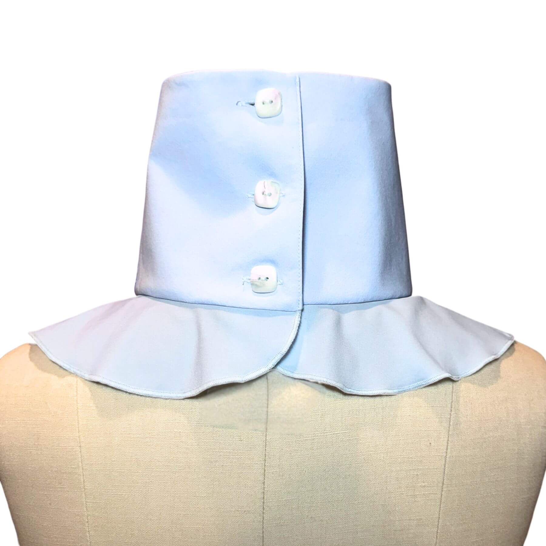 Back view of Sun Dickey showing smooth neck coverage and button closure detail