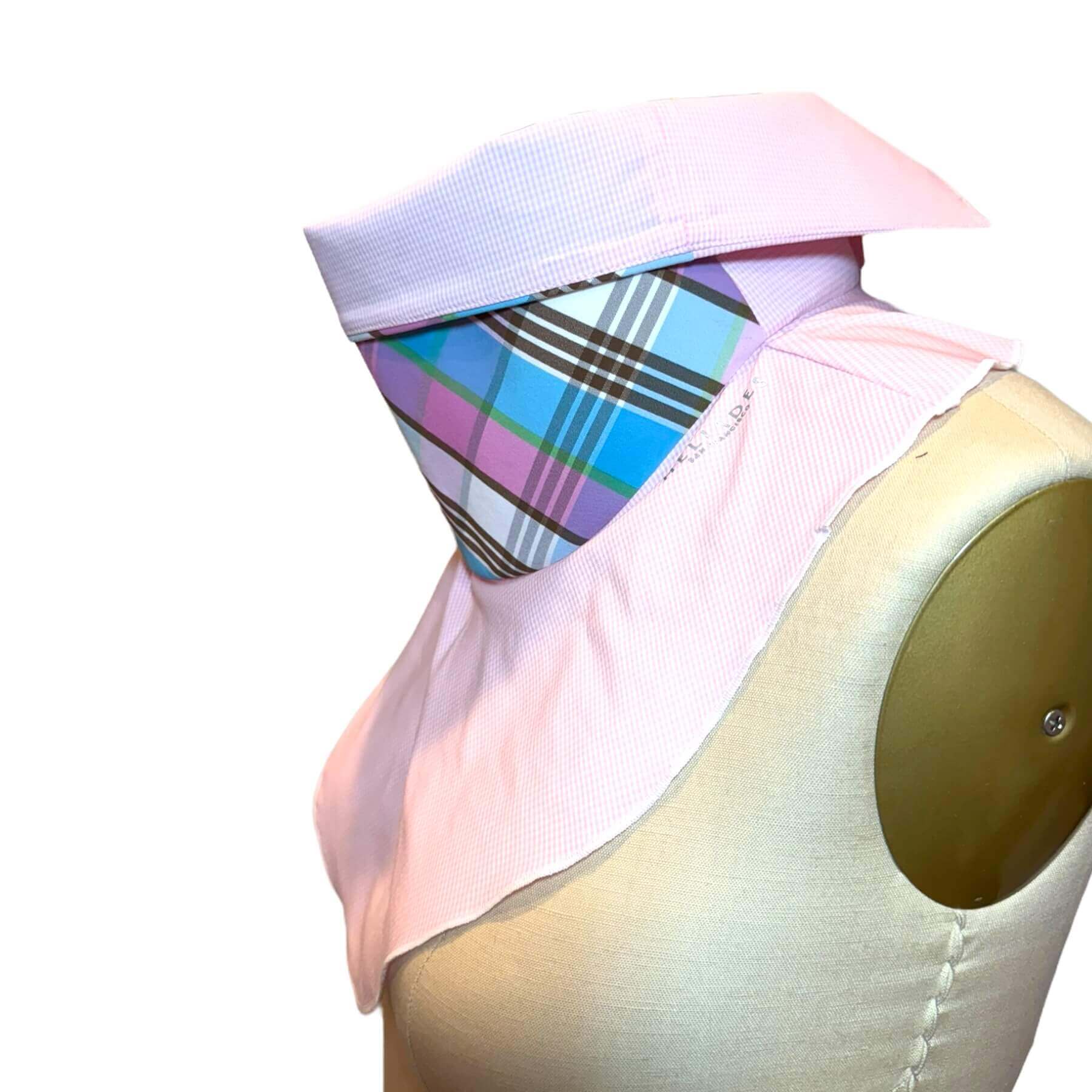 Side view of Sun Dickey with collar folded over in pink, white micro check with pink, blue, green and white plaid colorway.