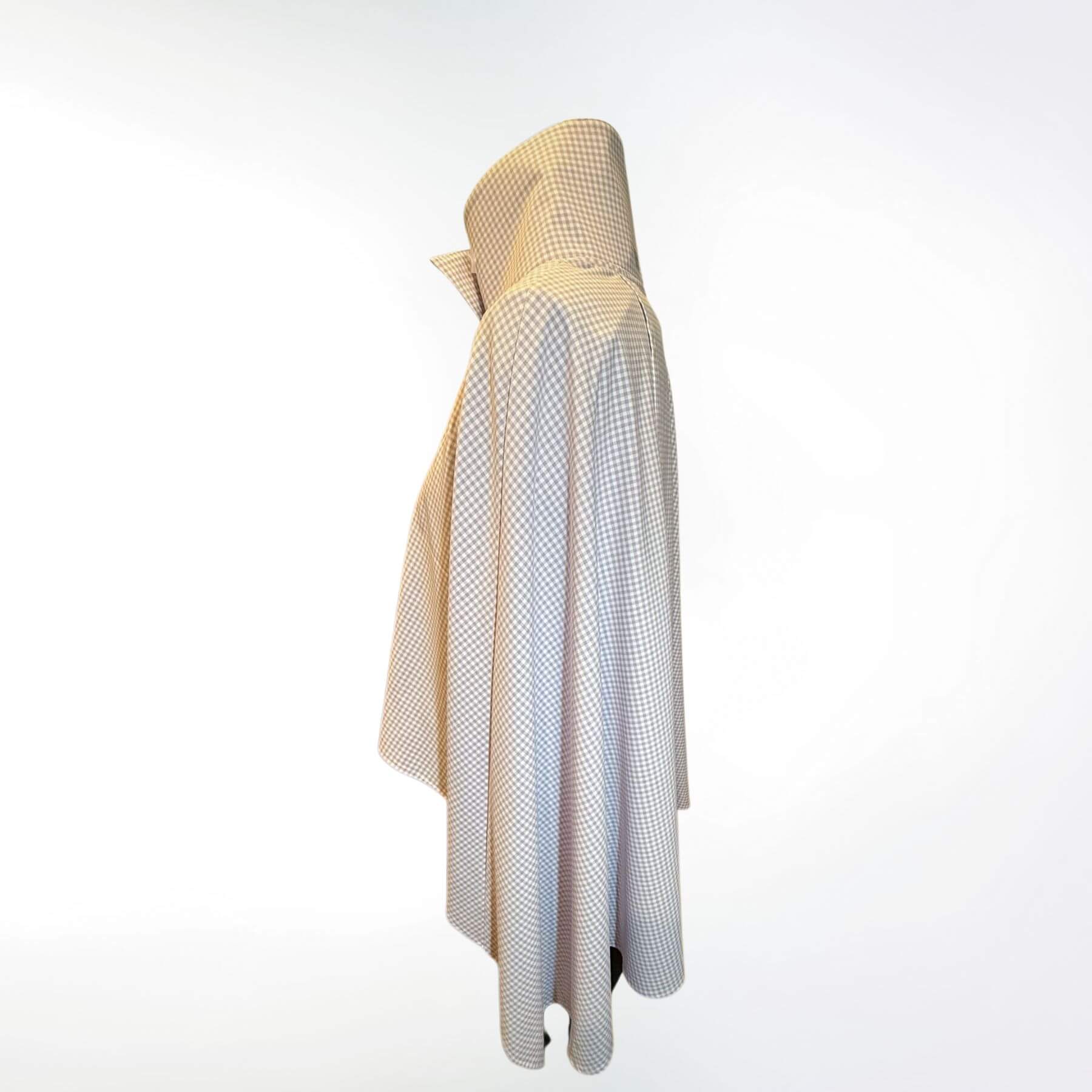 Side view of the Lavender Check Sun Protection Shoulder Wrap, UPF 50+ plaid fabric shown on mannequin with soft drape and high collar.