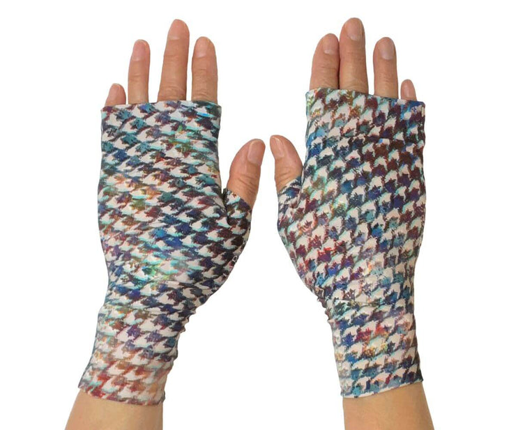Heliades UPF 50 Sun Protective Clothing lightweight UV sun gloves in stylish patterned fabric. Shown is fashionable, elegant allover painterly plaid print with blue, purple, green colors. UV sun covered hands shown front