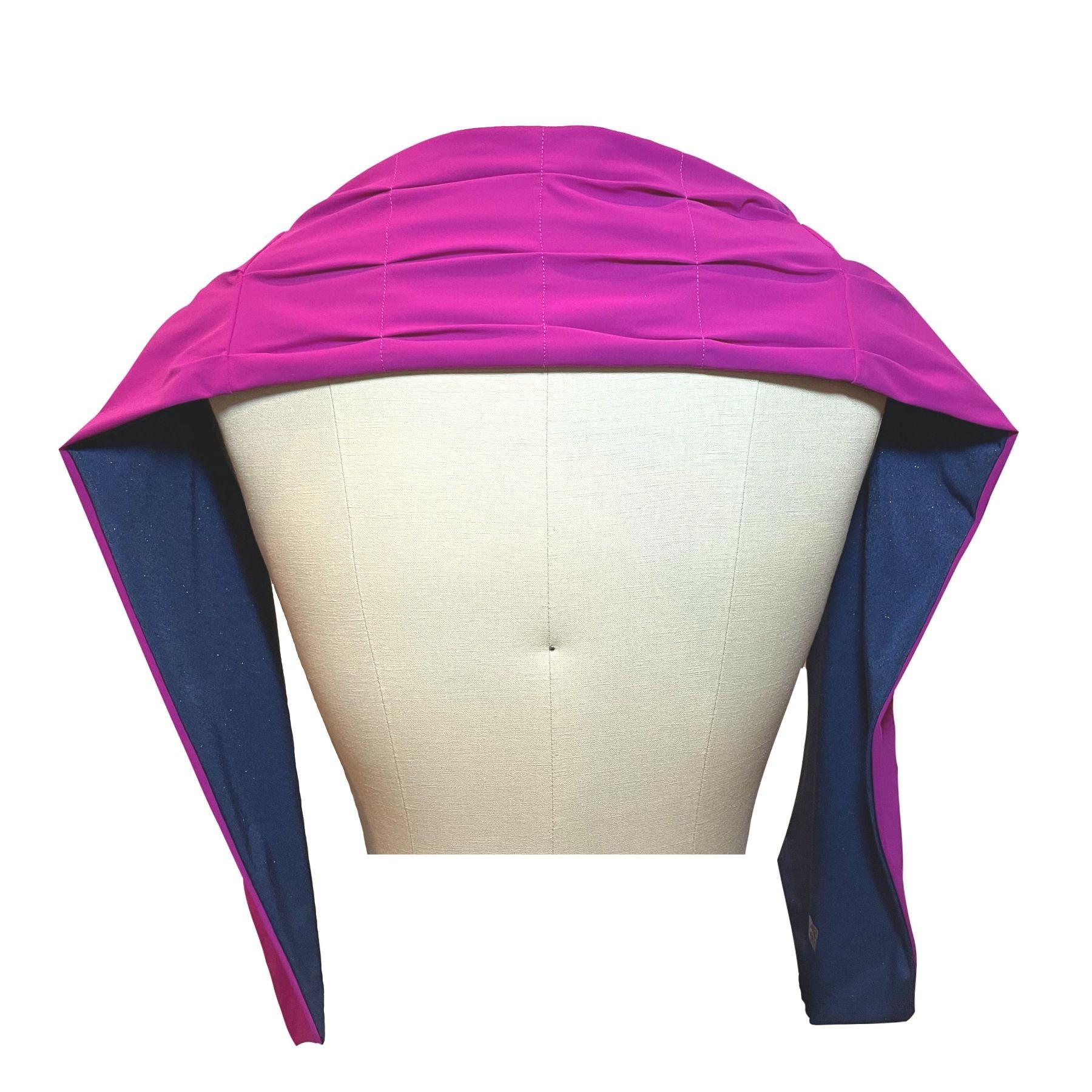 HELIADES UPF 50+ Sun Protection scarf shown styled as shawl over shoulders, color is sapphire blue with gold sparkles and reversible side is pink fuchsia color.