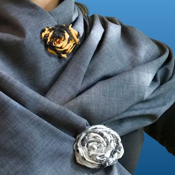 Hand made, upcycled spirit flower clips with Sol Escape sun protective shawl.