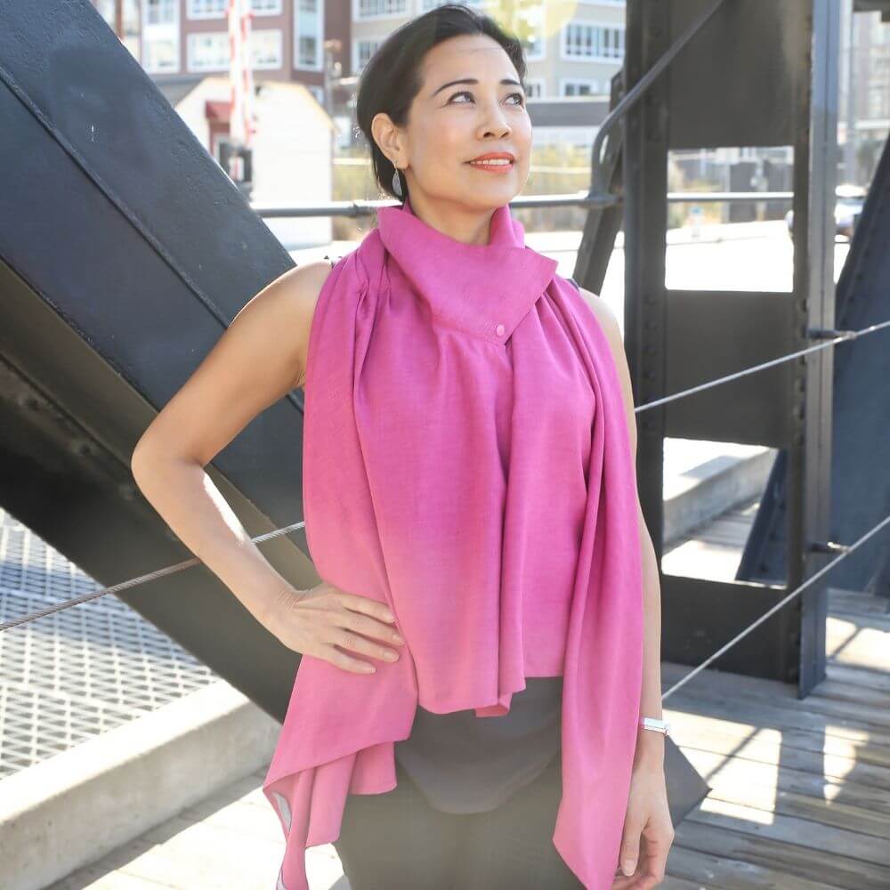 Heliades Berry Pink Sol Escape a UV sun protective cape with wide collar and finger loops to wear over clothing to protect skin from UV rays