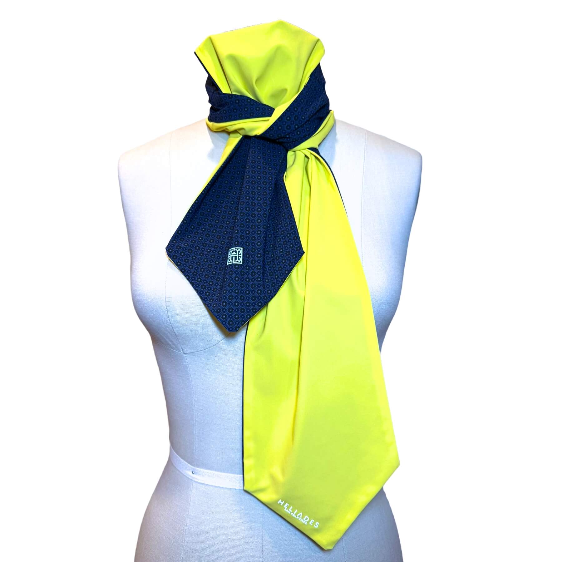 Sun scarf fashion UPF50+ shown on mannequin in pretty tanzanite blue rosette print with sunny lemon custard yellow on reverse.