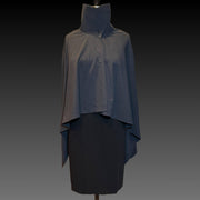 Front view of the Gray Melange Sun Shawl in UPF 50+ fabric, shown buttoned at the collar with collar up. Styled on a mannequin wearing a black dress against a black gradient background.