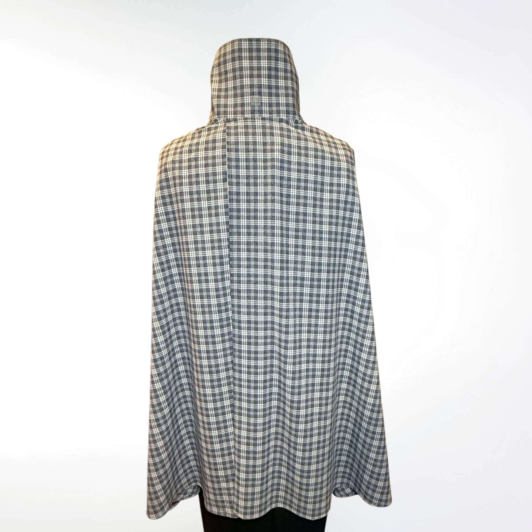 Back view of the Gray Plaid UV Shoulder Wrap in breathable UPF 50+ fabric, designed for chic sun coverage.