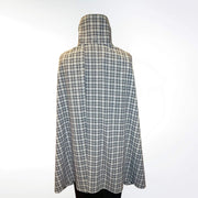 Back view of the Gray Plaid UV Shoulder Wrap in breathable UPF 50+ fabric, designed for chic sun coverage.