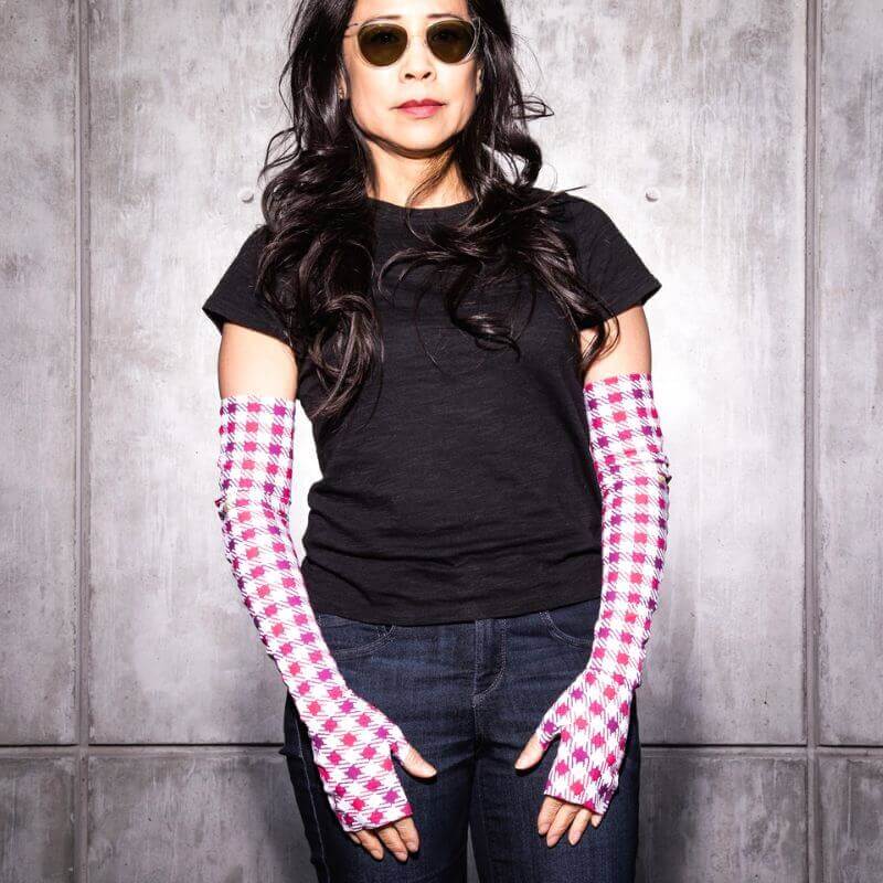 Colorful UPF 50+ sun sleeves in pink and plum plaid print