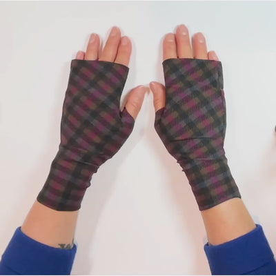 Plaid Heliades UV sun gloves for driving to prevent sun damaged skin shown paired with blue sweater