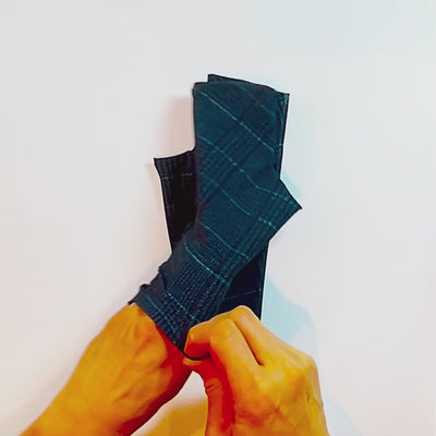 Wear gloves for sun protection to keep your hands shielded from sun damage in blue plaid fashion print