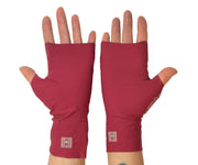 Heliades UPF 50 Sun Protective Clothing lightweight UV sun gloves in fashionable deep red color. UV sun covered hands shown with silver reflective logo trim