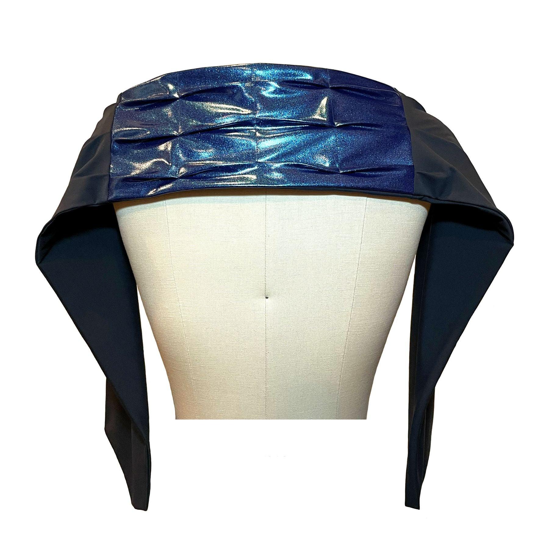 Wear the sleek  Heliades UPF 50+ Sun Protection scarf styled as UV shawl over shoulders, in deep blue glitter fabric with solid black hand pleated pattern.
