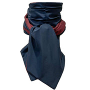 Heliades UPF 50+ Sun Protection scarf for Neck Chest decolletage UV Ray Coverage shown styled as Bridgerton Cravat Tie, color is burgundy deep red with gold sparkle pattern, reversible side is true navy blue solid color.