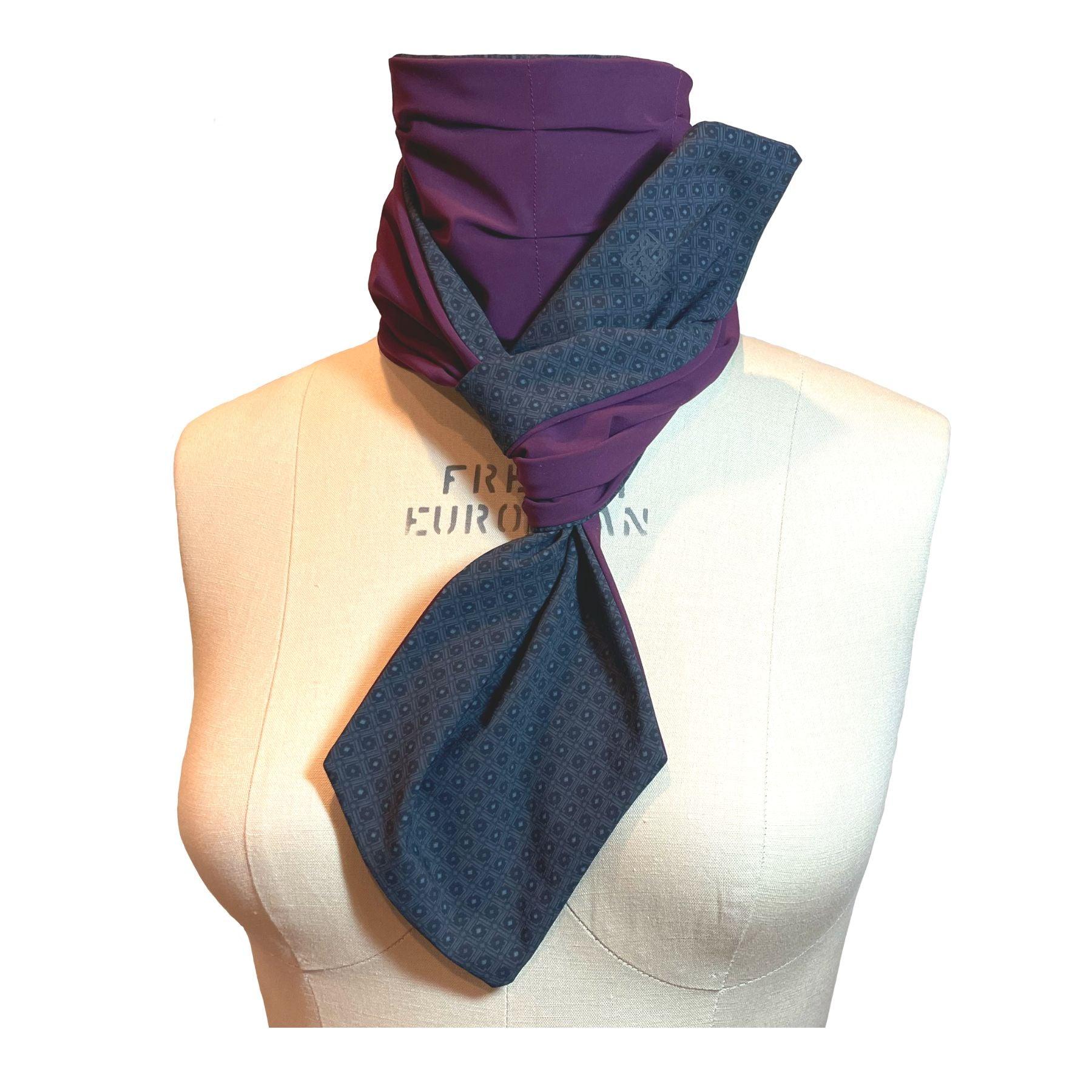 UPF 50+ Sun Protection scarf shown styled as Bridgerton Cravat Tie, color is charcoal gray rosette print and reversible side is purple eggplant color.