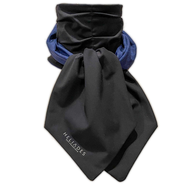 HELIADES UPF 50+ Sun Protection scarf for Neck Chest decolletage UV Sun Coverage shown styled as Bridgerton Cravat Tie, color is sapphire blue with gold sparkle pattern, reversible side is black cat black solid color.