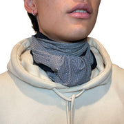 Gender neutral, unisex Heliades UPF50+ sun protection cravat, necktie, scarf in gray and black pinstripe. For UV sun coverage of neck, chest, décolletage